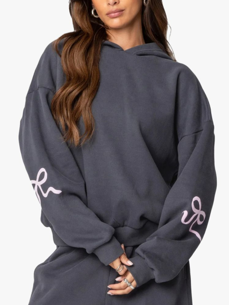 Edikted Bonney Bow Oversized Hoodie in branded component on a light gray background